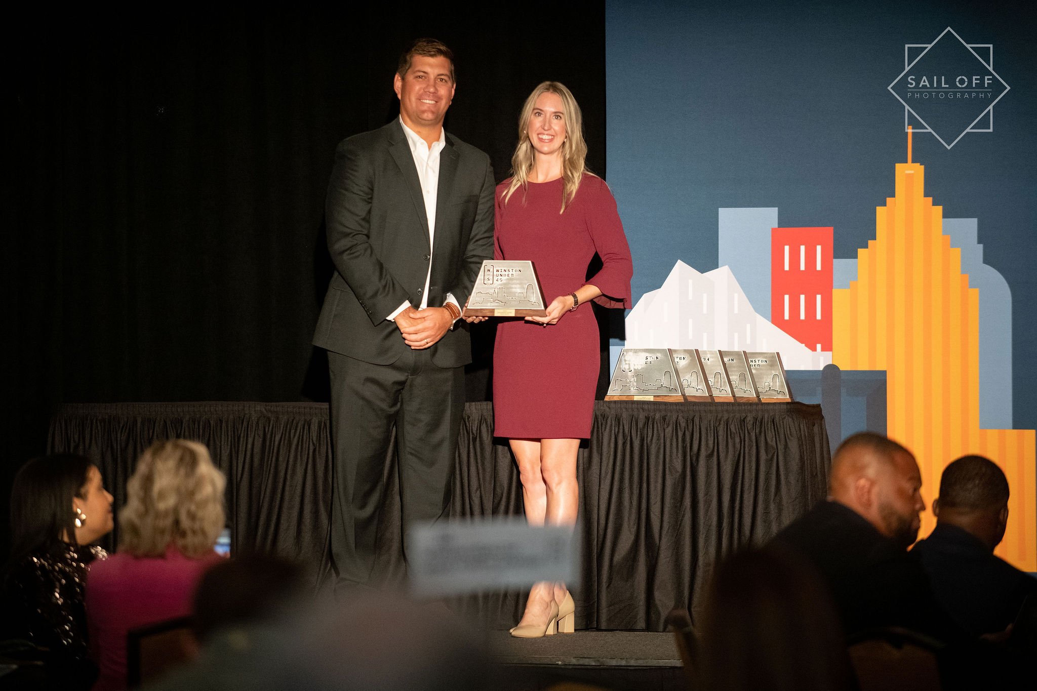 Inge Smith receives her award from Mark Owens