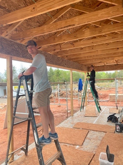 Taylor volunteering for Habitat for Humanity