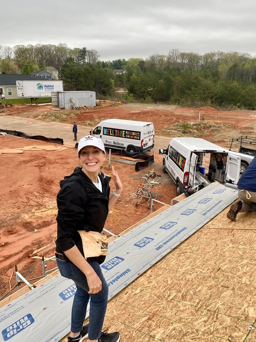 Tricia working on the roof